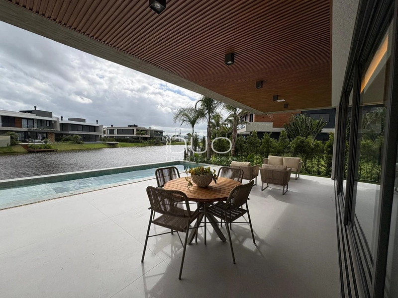 SOBRADO NO CONDOMÍNIO SENSE EM XANGRI-LÁ: 22ª foto da galeria de imagens do imóvel