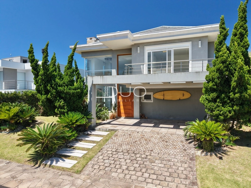 SOBRADO NO CONDOMÍNIO LAS DUNAS EM XANGRI-LÁ: 2ª foto da galeria de imagens do imóvel