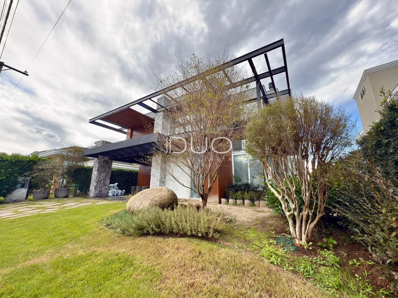 SOBRADO NO CONDOMÍNIO BOSQUES DE ATLÂNTIDA EM XANGRI-LÁ: 2ª foto da galeria de imagens do imóvel