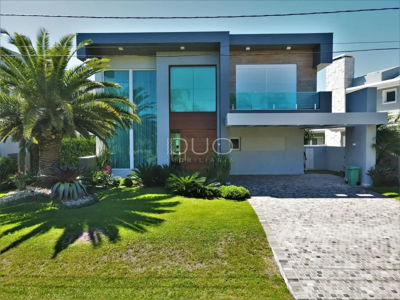 CASA NO CONDOMÍNIO ENSEADA LAGOS EM XANGRI-LÁ: 2ª foto da galeria de imagens do imóvel
