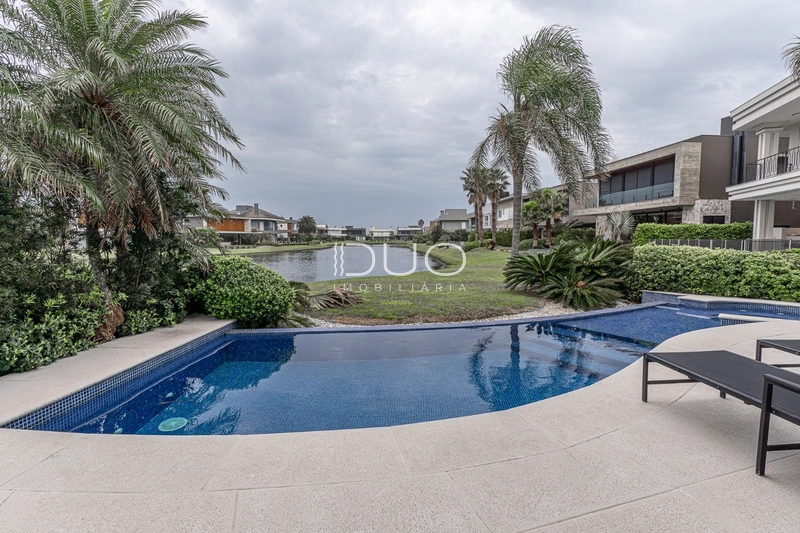 SOBRADO NO CONDOMÍNIO ENSEADA LAGOS EM XANGRI-LÁ: 22ª foto da galeria de imagens do imóvel