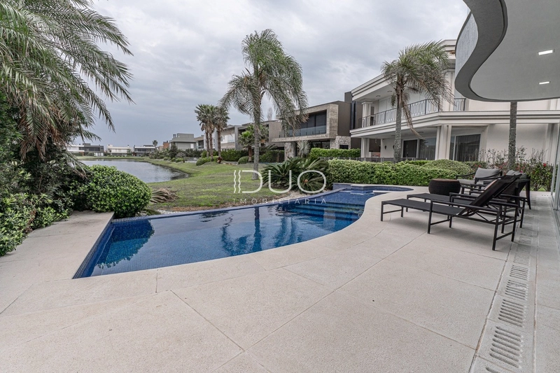 SOBRADO NO CONDOMÍNIO ENSEADA LAGOS EM XANGRI-LÁ: 20ª foto da galeria de imagens do imóvel