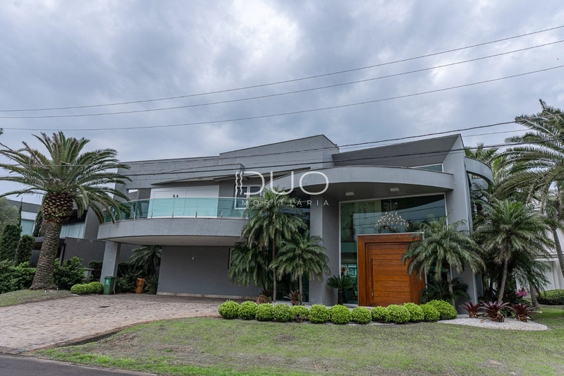 SOBRADO NO CONDOMÍNIO ENSEADA LAGOS EM XANGRI-LÁ: 2ª foto da galeria de imagens do imóvel