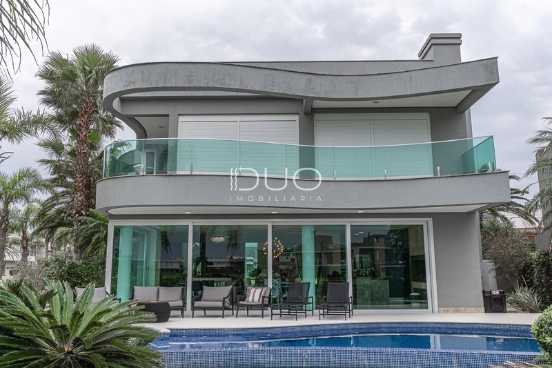 SOBRADO NO CONDOMÍNIO ENSEADA LAGOS EM XANGRI-LÁ: 29ª foto da galeria de imagens do imóvel