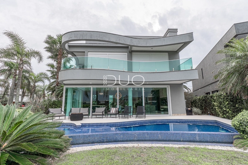 SOBRADO NO CONDOMÍNIO ENSEADA LAGOS EM XANGRI-LÁ: 24ª foto da galeria de imagens do imóvel