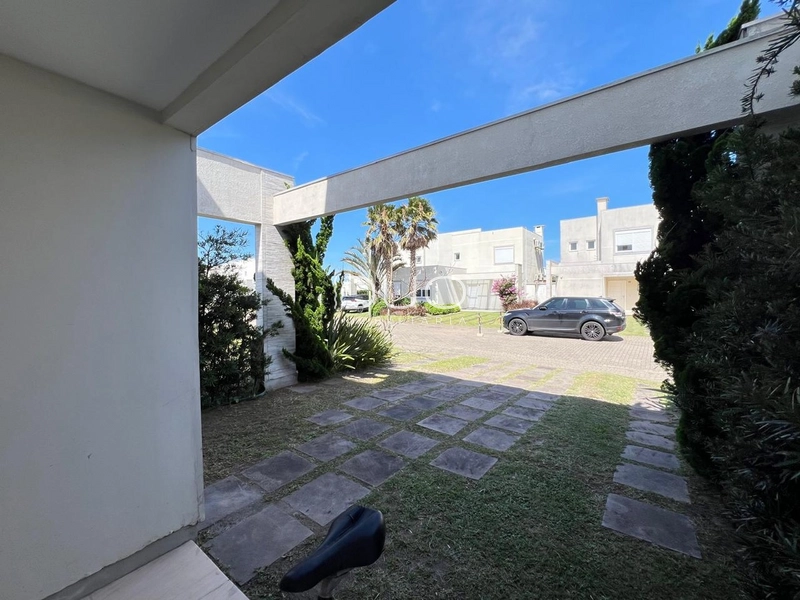 SOBRADO NO CONDOMÍNIO PATEO MARBELLA EM XANGRI-LÁ: 5ª foto da galeria de imagens do imóvel