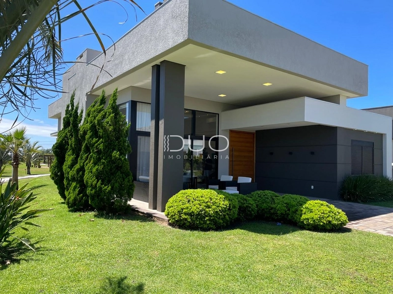 CASA NO CONDOMÍNIO RIVIERA EM XANGRI-LÁ: 2ª foto da galeria de imagens do imóvel