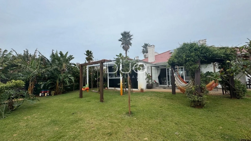 CASA 04 DORMITÓRIOS EM CONDOMÍNIO DE XANGRI-LÁ: 3ª foto da galeria de imagens do imóvel
