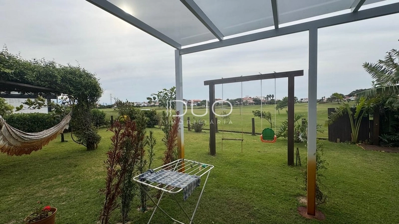 CASA 04 DORMITÓRIOS EM CONDOMÍNIO DE XANGRI-LÁ: 10ª foto da galeria de imagens do imóvel