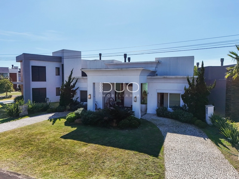 CASA NO CONDOMÍNIO RIVIERA EM XANGRI-LÁ: 3ª foto da galeria de imagens do imóvel