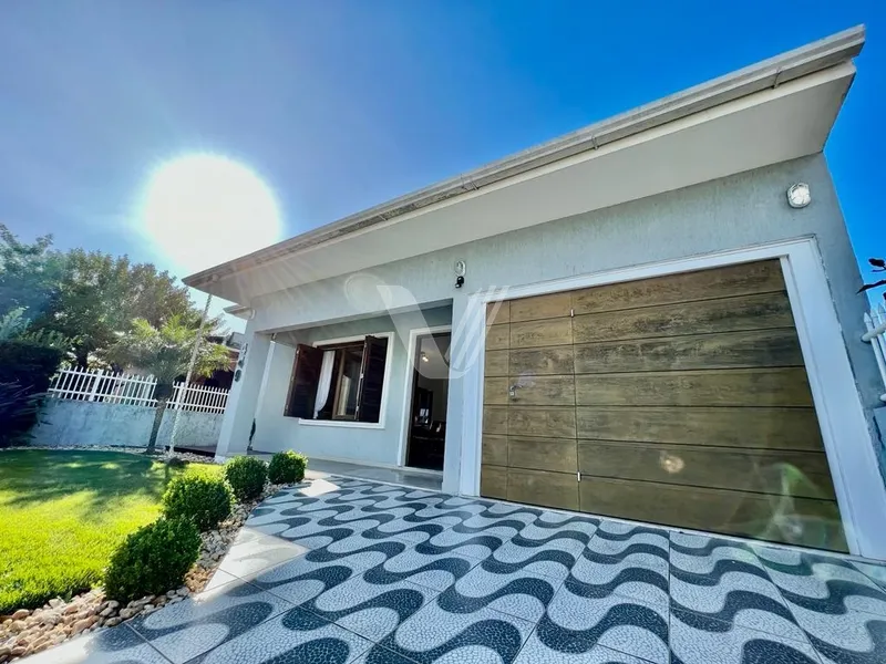 Casa 3 dormitórios em Xangri-Lá: 2ª foto da galeria de imagens do imóvel