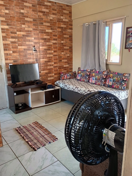 CASA  À VENDA NA PRAIA DE TORRES: 11ª foto da galeria de imagens do imóvel