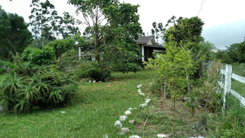 CASA DE MADEIRA EM TERRA DE AREIA: 13ª foto da galeria de imagens do imóvel