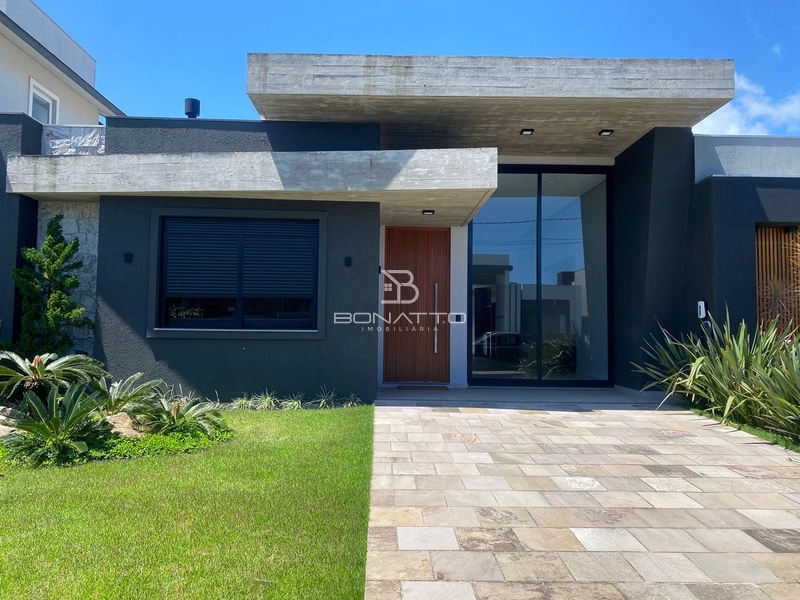 Casa à venda com 4 suites independentes: 1ª foto da galeria de imagens do imóvel