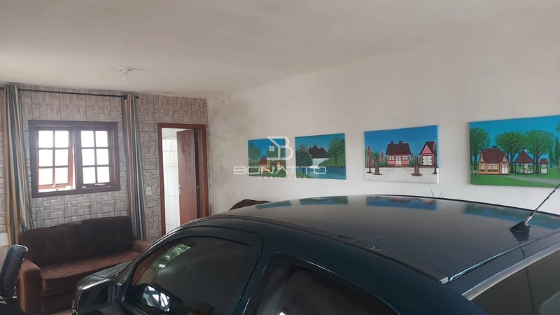 Casa à Venda em Atlântida Sul – Conforto e Qualidade!: 3ª foto da galeria de imagens do imóvel