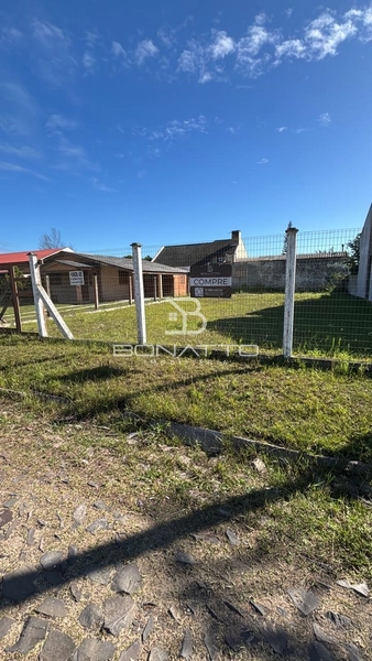 Lote á venda em Atlantida Sul: 1ª foto da galeria de imagens do imóvel
