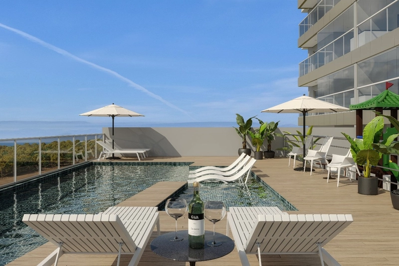 APARTAMENTO LATERAL EM EDIFÍCIO FRENTE MAR NA PRAIA CENTRAL: 3ª foto da galeria de imagens do imóvel