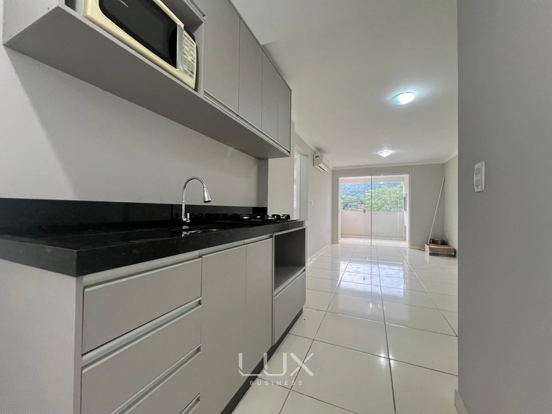 APARTAMENTO EM REGIÃO TRANQUILA COM TUDO POR PERTO EM ITAPEMA: 2ª foto da galeria de imagens do imóvel