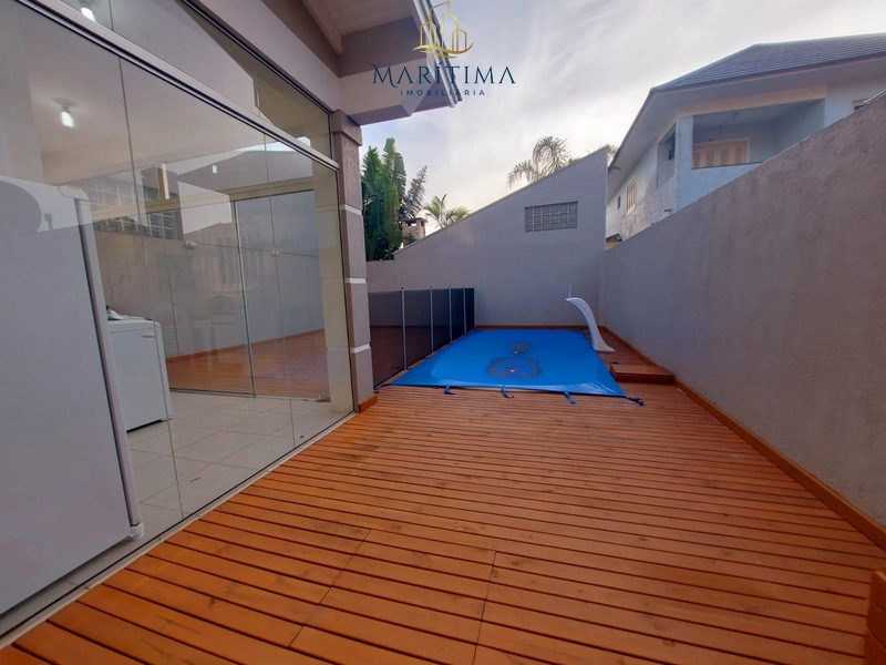 Casa de 03 dormitórios com piscina, em frente ao mar!: 5ª foto da galeria de imagens do imóvel