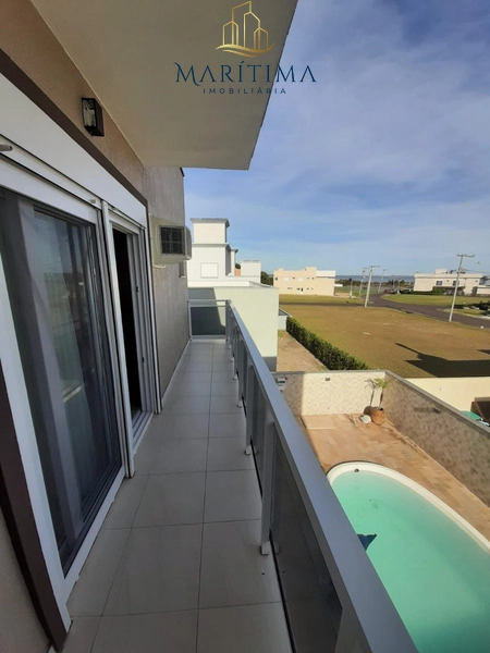 Linda casa com piscina em condomínio alto padrão.: 1ª foto da galeria de imagens do imóvel