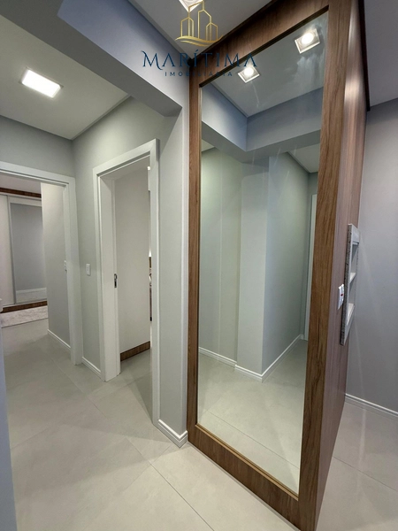Apartamento decorado, 2 dormitórios leste norte com terraço no Centro!: 8ª foto da galeria de imagens do imóvel