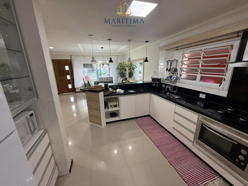 No Centro de Tramandaí – 3 Dorms, 2 Suítes, Piscina e Espaço Gourmet: 9ª foto da galeria de imagens do imóvel