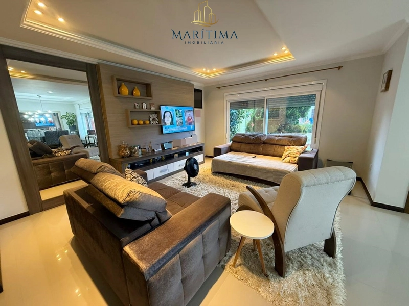 No Centro de Tramandaí – 3 Dorms, 2 Suítes, Piscina e Espaço Gourmet: 4ª foto da galeria de imagens do imóvel