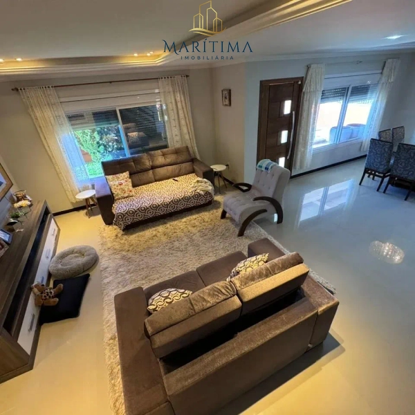 No Centro de Tramandaí – 3 Dorms, 2 Suítes, Piscina e Espaço Gourmet: 3ª foto da galeria de imagens do imóvel