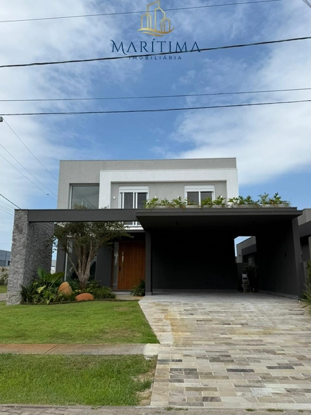 Sobrado à beira do lago – 5 suítes – Condomínio no litoral!: 1ª foto da galeria de imagens do imóvel