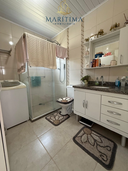 Casa a venda no Centro de Tramandaí, próxima ao mar: 22ª foto da galeria de imagens do imóvel