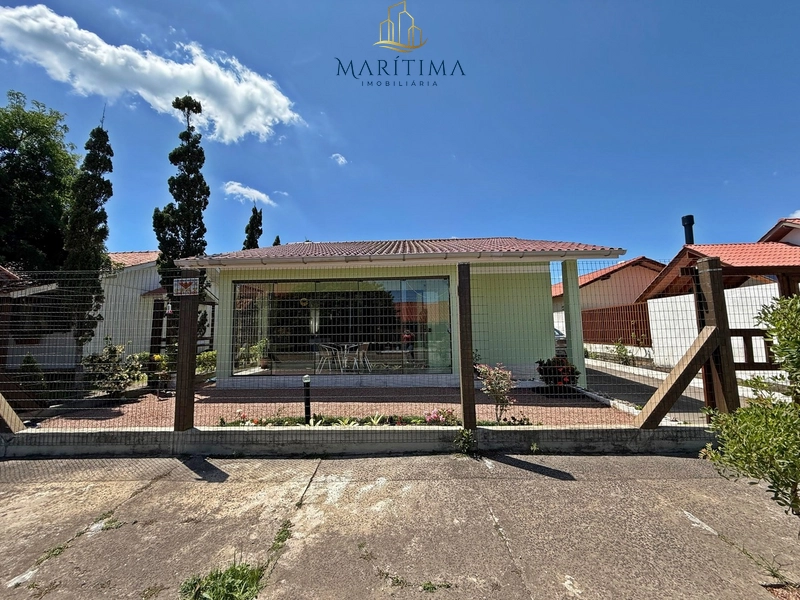 Casa a venda no Centro de Tramandaí, próxima ao mar: 1ª foto da galeria de imagens do imóvel