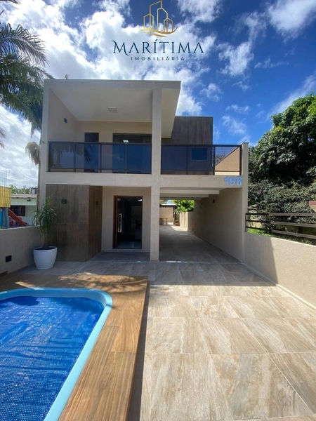 Casa mobiliada com piscina a venda no Centro de Imbé: 1ª foto da galeria de imagens do imóvel