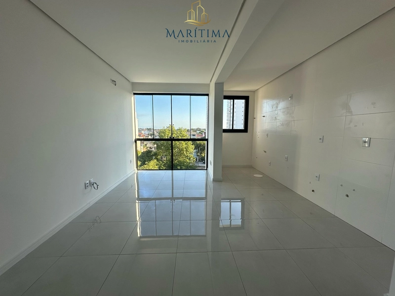 Apartamento com 2 dormitórios (1 suíte) no centro de Tramandaí – Edifí: 1ª foto da galeria de imagens do imóvel