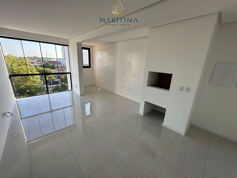 Apartamento com 2 dormitórios (1 suíte) no centro de Tramandaí – Edifí: 2ª foto da galeria de imagens do imóvel