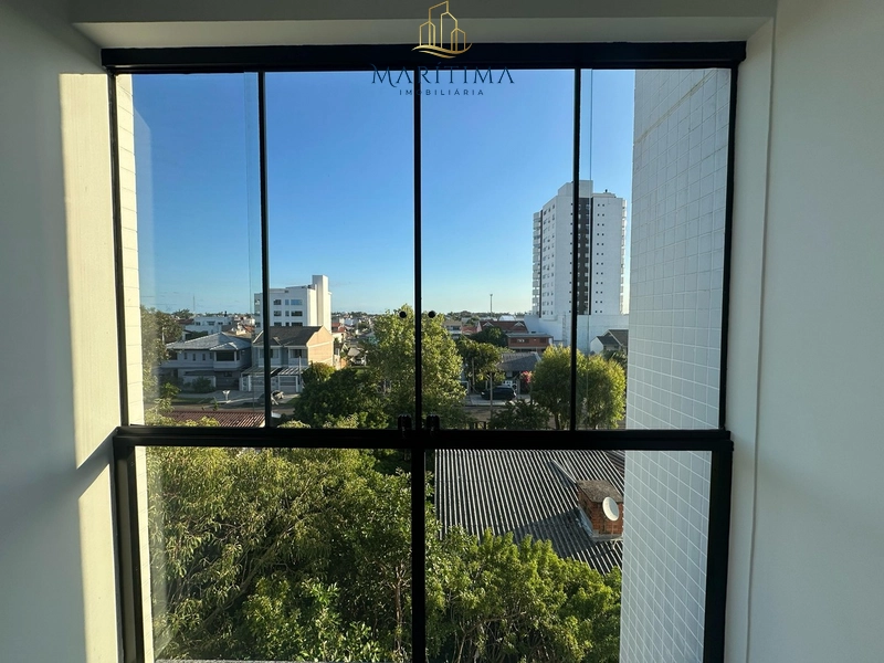 Apartamento com 2 dormitórios (1 suíte) no centro de Tramandaí – Edifí: 3ª foto da galeria de imagens do imóvel