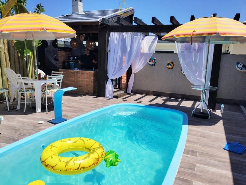 Casa a venda em Tramandaí, com 3 quartos e piscina, próxima ao mar!: 12ª foto da galeria de imagens do imóvel