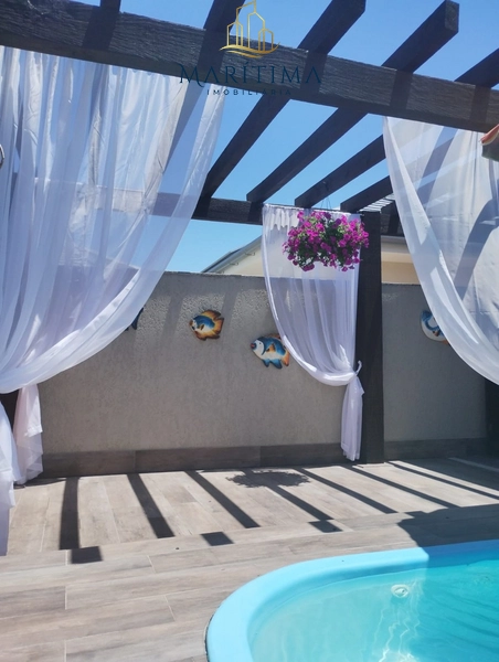 Casa a venda em Tramandaí, com 3 quartos e piscina, próxima ao mar!: 13ª foto da galeria de imagens do imóvel