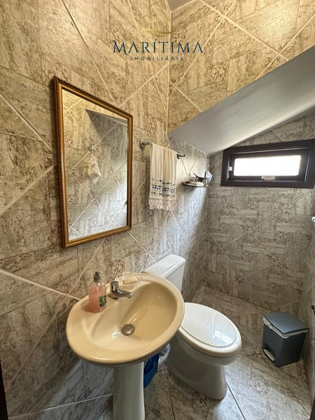 Amplo sobrado para quem busca por espaço e conforto junto a praia: 10ª foto da galeria de imagens do imóvel