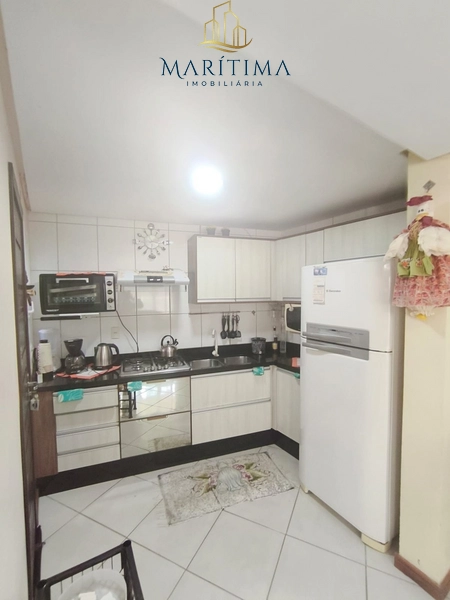 Sobrado 3 dormitórios com suite, pé na areia: 10ª foto da galeria de imagens do imóvel