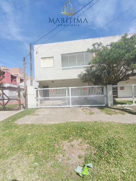 Sobrado 3 dormitórios com suite, pé na areia: 2ª foto da galeria de imagens do imóvel