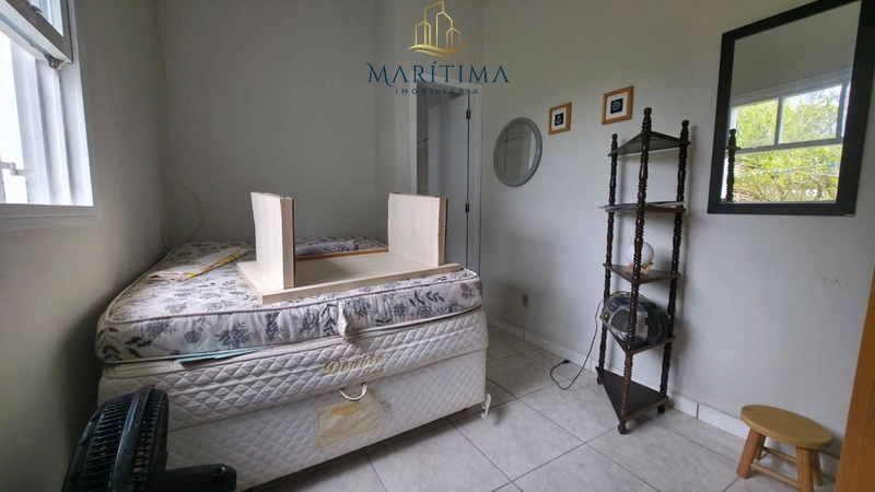 Casa com 03 dormitórios a poucos metros do Mar!: 8ª foto da galeria de imagens do imóvel