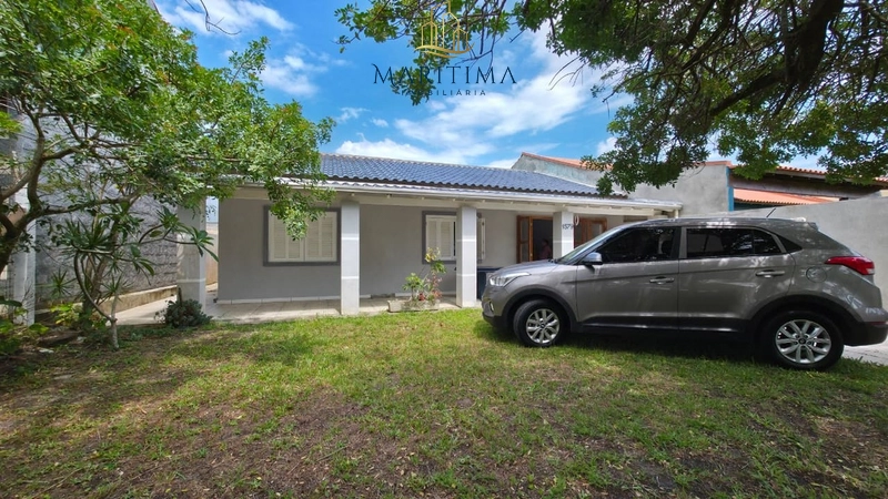 Casa com 03 dormitórios a poucos metros do Mar!: 3ª foto da galeria de imagens do imóvel