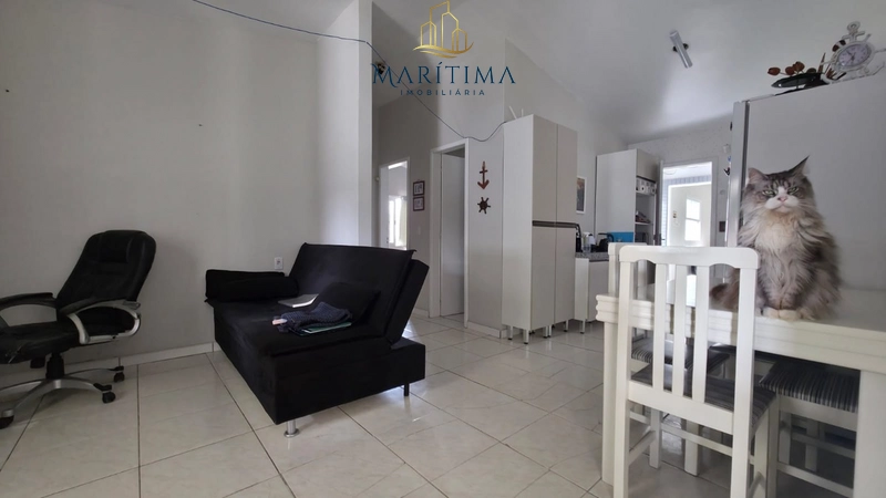 Casa com 03 dormitórios a poucos metros do Mar!: 4ª foto da galeria de imagens do imóvel