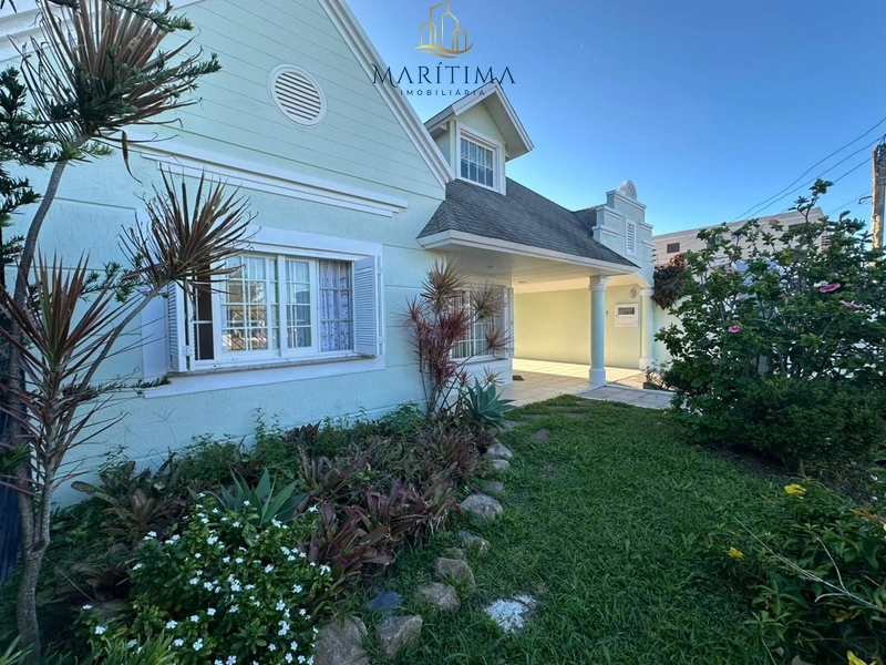 Casa estilo americana junto ao mar em Tramandaí: 2ª foto da galeria de imagens do imóvel