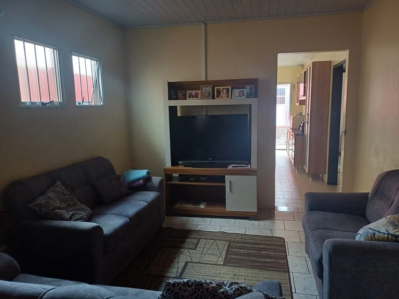 CASA 4 DORMITÓRIOS COM ÁREA GOURMET E PISCINA EM CAMAQUÃ.: 2ª foto da galeria de imagens do imóvel