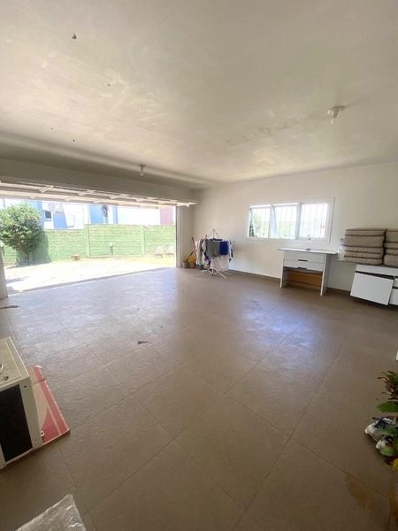 Casa Moderna de 251m² com Amplo Pátio Próximo ao Fórum, Montenegro: 21ª foto da galeria de imagens do imóvel