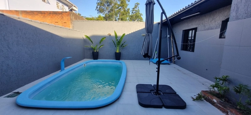 Casa de 3 Dormitórios com Piscina e Espaço Gourmet em Montenegro: 13ª foto da galeria de imagens do imóvel