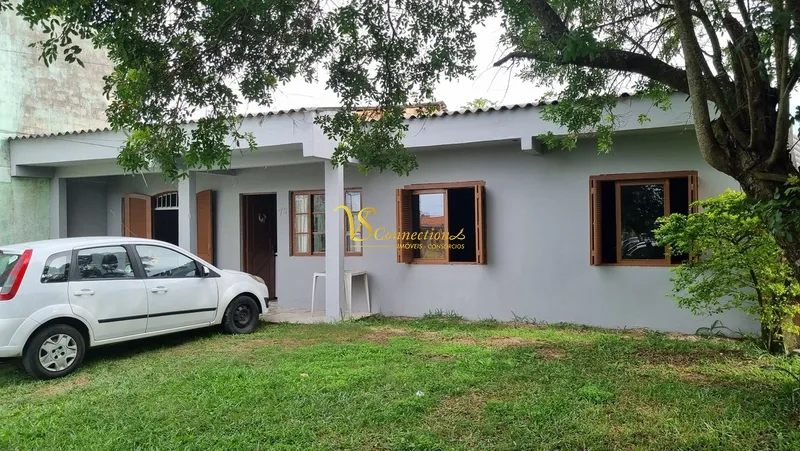 Casa à venda com laje em Atlântida Sul