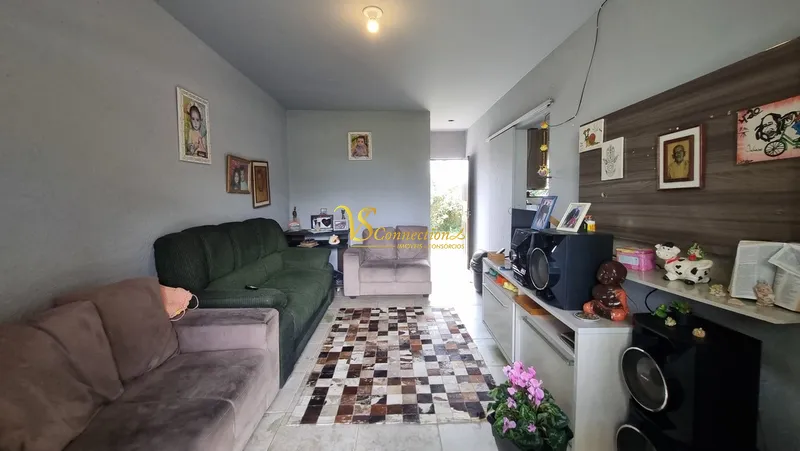 Casa à venda com laje em Atlântida Sul: 3ª foto da galeria de imagens do imóvel