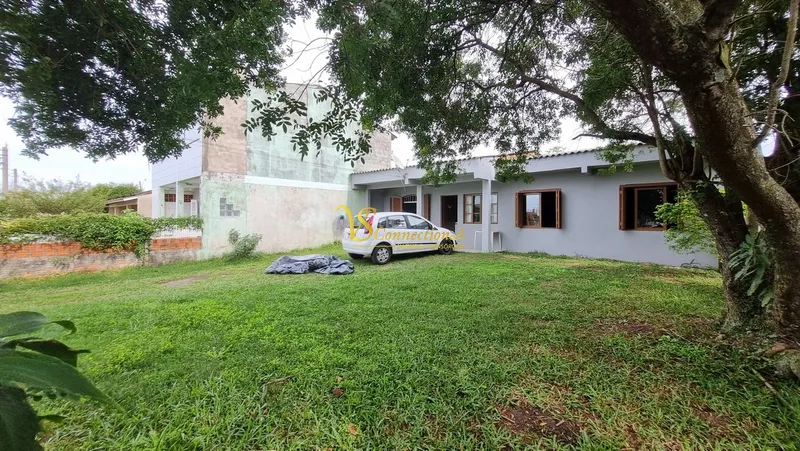 Casa à venda com laje em Atlântida Sul: 2ª foto da galeria de imagens do imóvel